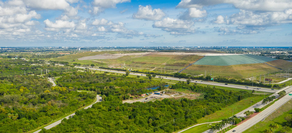 Florida landfill with city in background