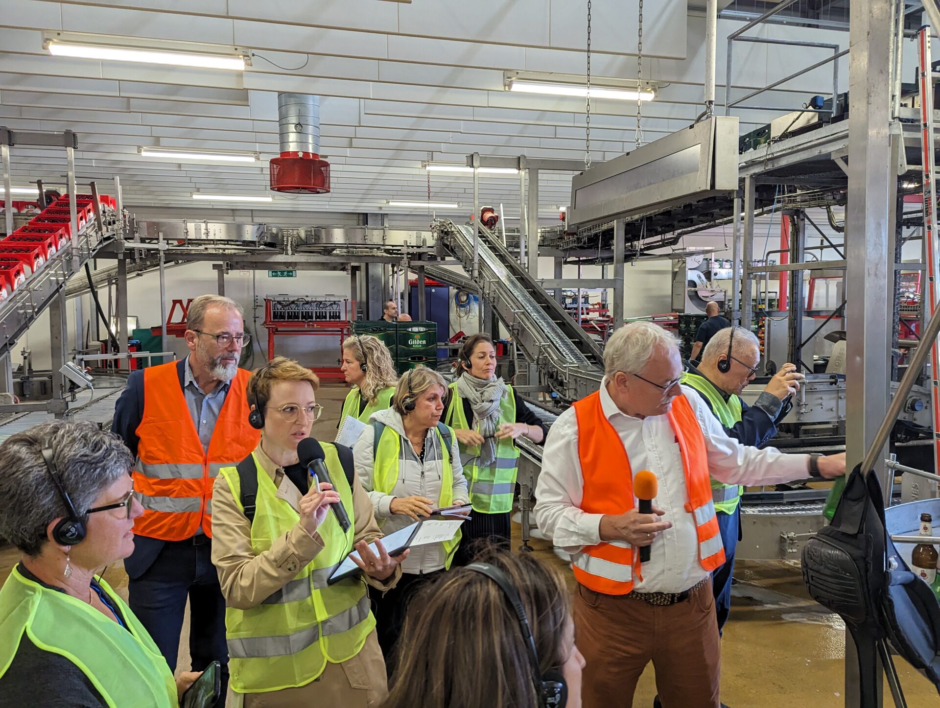 Environmental advocates touring European bottling companies.