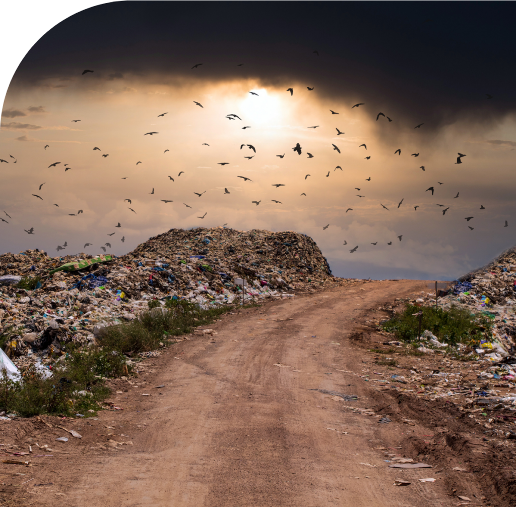 landfill against dark sky sunset