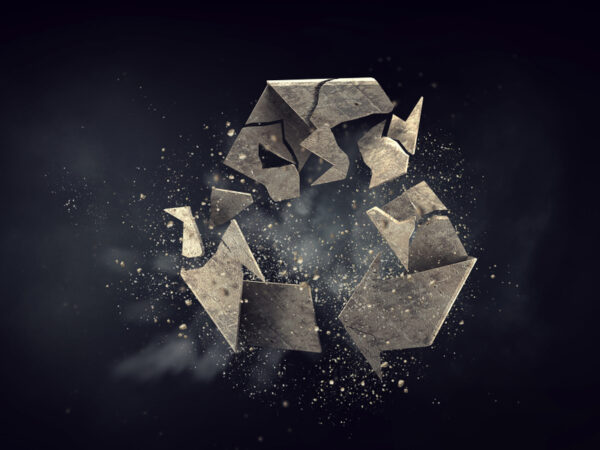 Illustration of a recycling symbol breaking apart, representing the gap between chemical recycling claims and reality.